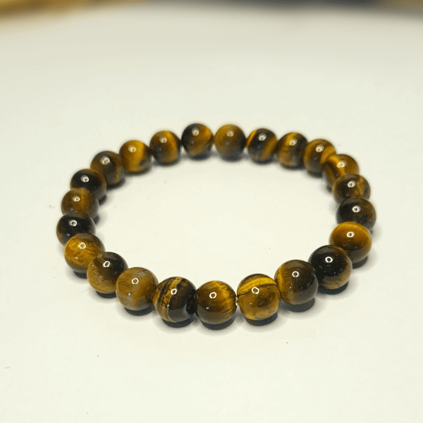 Bracelet Œil de Tigre 8mm pierres roulées effet chatoyant - Reflets dorés hypnotisants protection active