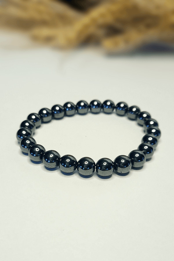 Bracelet Hématite 8mm pierres roulées gris métallique lithothérapie - Pierre ancrage puissant courage force
